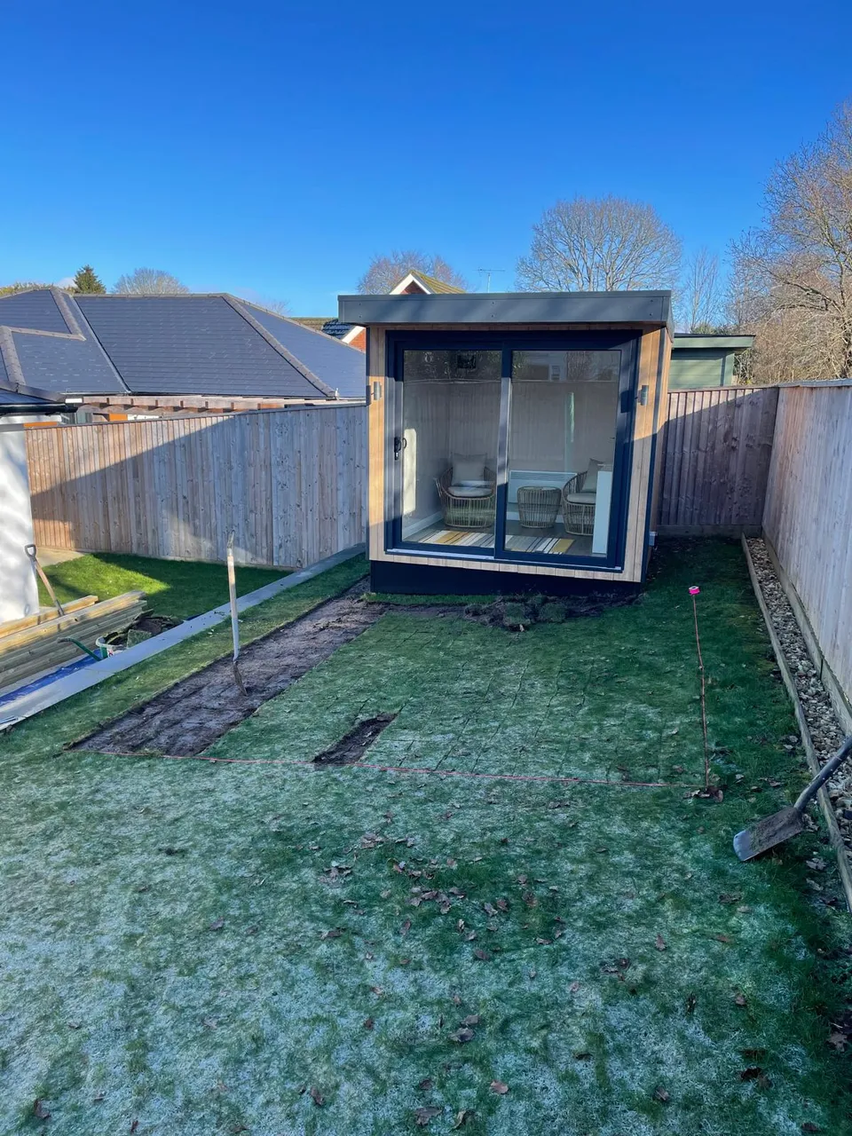 Garden room on the lawn before the decking was added